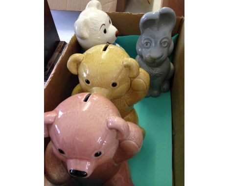 4 ceramic money boxes - 3 teddy bears and a rabbit.