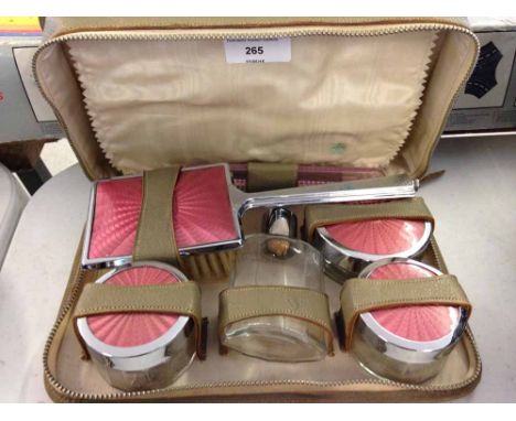 A ladies guilloche pink enamel travelling vanity case by Two-Tix in leather case.