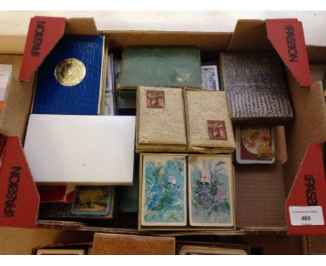 A box of assorted vintage playing cards to include Waddingtons.