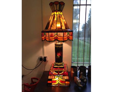A large and impressive Tiffany style glass lamp all hand made by stained glass artist David Warren in 1989. Height 42" (107cm
