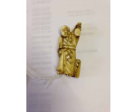 An unsigned netsuke of a man holding a gourd aloft.