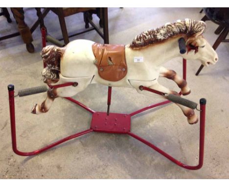 A vintage sprung rocking horse c1960-70s.