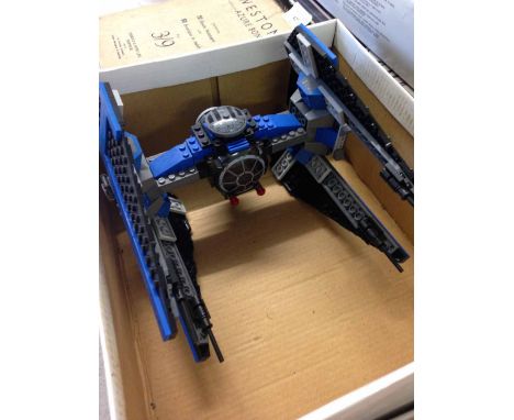 A Lego Star Wars Tie Fighter with Darth Vader minifig - unboxed.