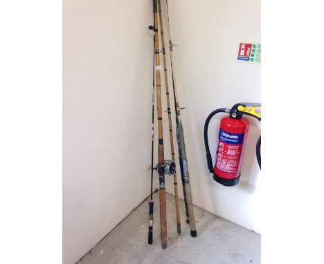 4 vintage fishing rods to include a bamboo cane sea rod with Penn Senator 113 reel