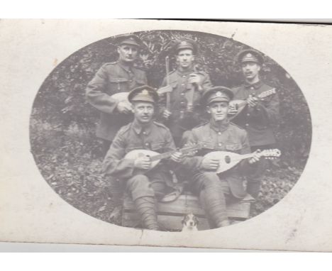 British WWI Royal Engineers Band picture, it shows men playing Uele's with their little dog mascot. A fantastic postcard of h