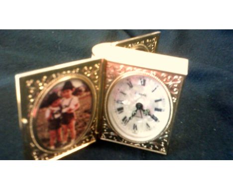 Vintage clock-small travel clock-made in Germany, Europa, 2 Jewell, in shape of a book - both sides open-in working order