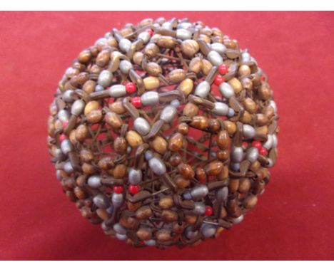 Norfolk Regiment Related item, said to be a Norfolk Regiment Prisoner of War made ball using safety pins and wooden beads. A 
