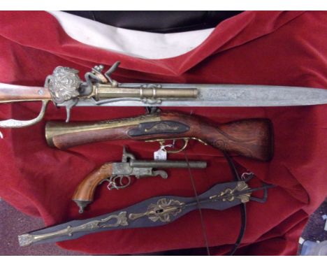 Replica weapon lot (4) including: A blunderbuss, two barrelled musket pistol, Crossbow and musket mounted hunting sword. Good