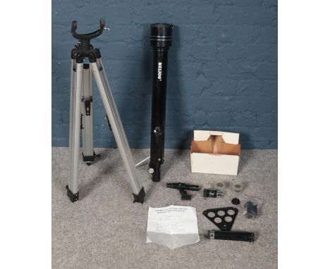 A 'Helios' telescope with tripod. To include a box of lenses and eye pieces etc. L: 71cm.  Condition good. D=60mm F=700mm.