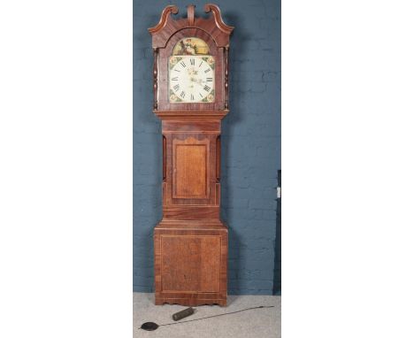 A large Victorian mahogany single weight longcase clock. With twin swan neck pediment, painted dial, dial marked Bates Hudder