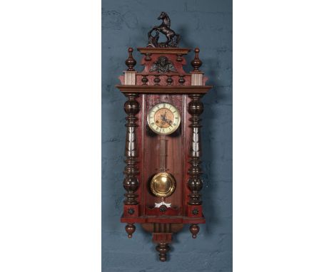 An early 20th century mahogany cased 8 day wall clock. By Friedrich Mauthe, Schwenningen.  Movement serviced. Case refurbishe