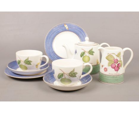 A Wedgwood 'Sarah's Garden' 2 piece tea set. Teapot, milk jug, cups/saucers, side plates.  