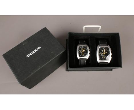 A boxed ladies &amp; gents 'Volvo' trucks chronograph watches.  Condition good. Both with leather straps.