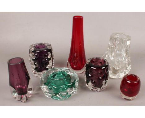 A quantity of coloured art glass. Including Liskeard glass, slender vase, etc.  