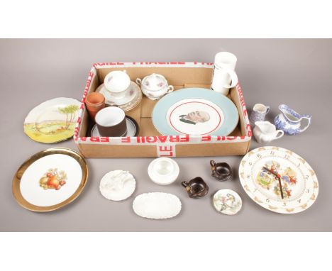 A collection of ceramics. Includes Bunnykins, Royal Doulton wall clock etc.  