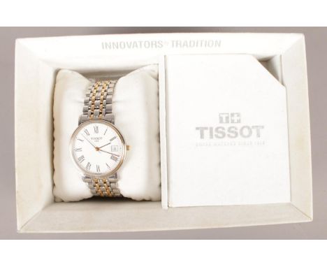 A boxed 2004 'Tissot' men's bracelet wrist watch - Model no T870/970.  Condition good. Watch comes with all paperwork and ins