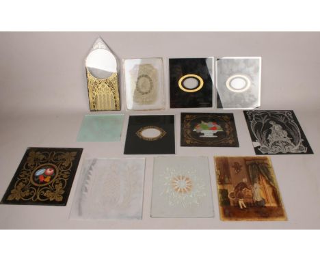 A quantity of clock glass panels.  