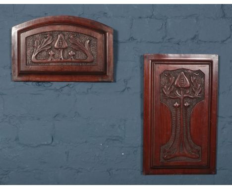 Two mahogany panels, carved in the Art Nouveau style.  
