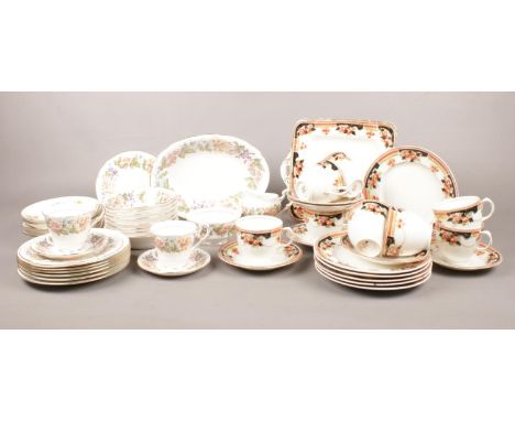 A  Paragon 'Country Lane' tea set and other similar example. cups/saucers, side platers etc.  