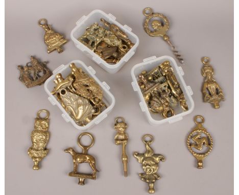 A quantity of brass button hook handles.  
