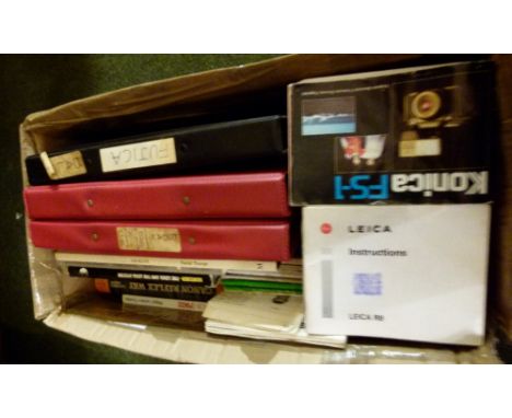 Box of photographic reference books and camera instruction books