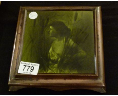 Art Nouveau copper kettle stand with inset green Minton? tile depicting scantily clad female in bullrushes. W: 19cm