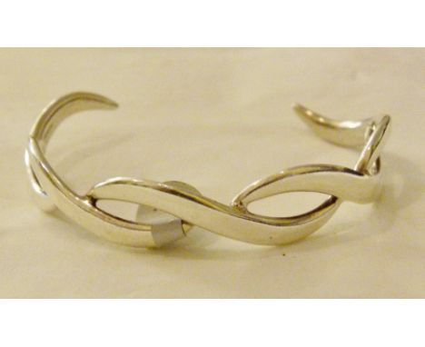 Sterling silver solid fancy bangle.