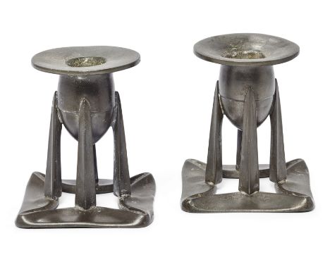 Archibald Knox (1864-1933) for Liberty & Co. Pair of Tudric candlesticks, model no.0222, circa 1900  Pewter  Both impressed w