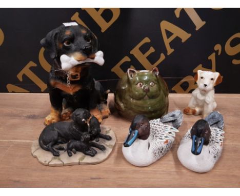CERAMIC AND RESIN ANIMAL FIGURINES TO INCLUDE A ROTTWEILER PUPPY A PAIR OF DUCKS ETC. 12