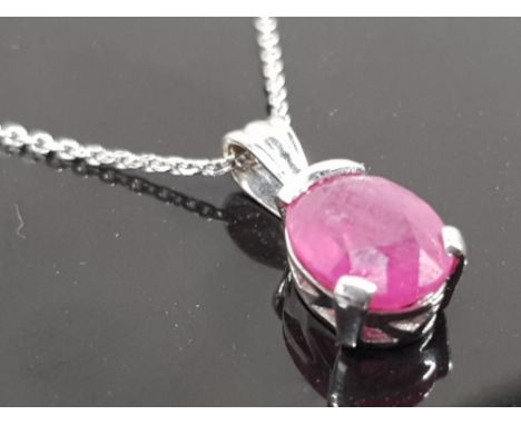 18CT WHITE GOLD RUBY PENDANT 3.1G
