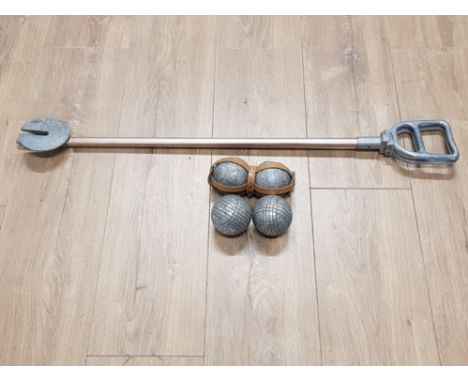 TWO SETS OF CARPET BOULES AND A SHOOTING STICK MADE IN ENGLAND