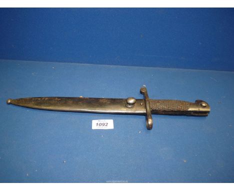 A Toledo Spain fixed blade Bayonet with scabbard stamped 5813 D.