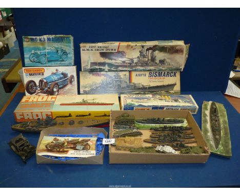 A large box of vintage plaster kits, some boxed, including tanks, battleships, Airfix etc.
