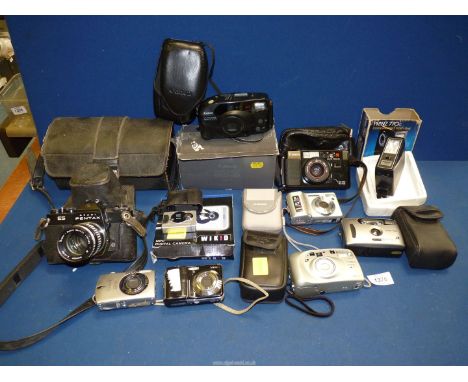 A quantity of cased digital compact Cameras including Canon, Samsung, Prinz 770 flash unit, etc.