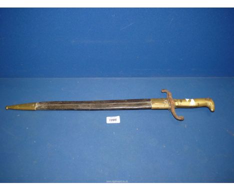 A Coulaux Klingenthal Bayonet with scabbard with brass inscribed 5.3.R.R  6 .SS, 25'' long, (some rust).