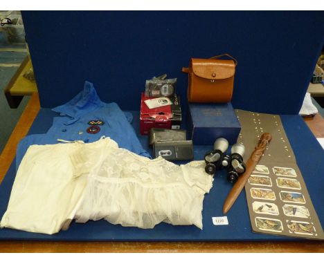 A quantity of miscellanea to include; a boxed Casio Exilim EX-Z100 camera, Nipole 10x40 binoculars, letter opener, lace Chris