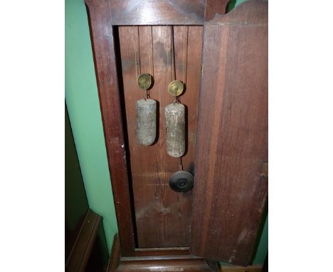 A cross-banded Oak cased Longcase Clock having a painted face with Roman hour numerals and Arabic minutes with an inset secon