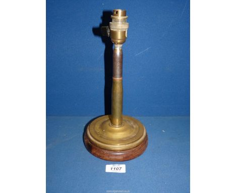 A WWII Trench art table lamp made from a round from a Spitfire, 11 1/2'' tall.