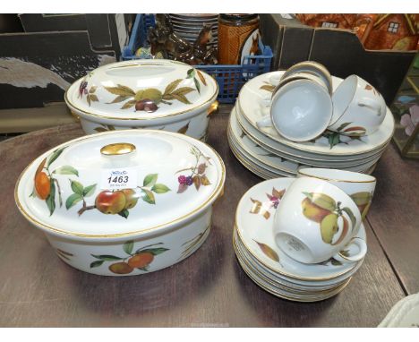 A quantity of Royal Worcester Evesham china including; 7 dinner plates, 6 cups &amp; saucers and 2 lidded vegetable tureens.