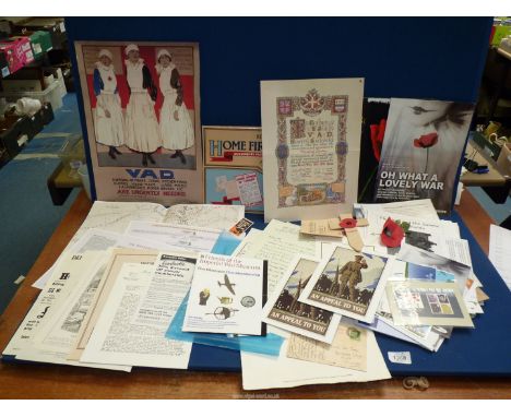 A basket of WWI memorabilia including Daily Telegraph map of The British Front, facsimiles of identity cards, copies of docum