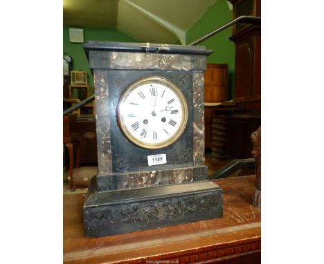 A 1909 Marble Mantle clock having Roman numerals, 14 1/4'' high x 11'' wide x 6 1/4'' deep, with key, (glass cracked).