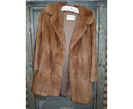 A Maxwell Croft fur jacket, light brown, size Medium.
