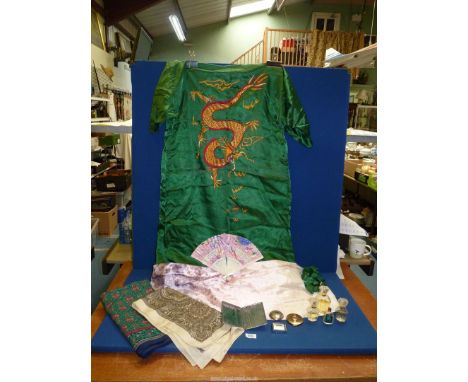 A quantity of miscellanea including scarves, kimono, bottles of perfume, compact, snuff box, cigarette holder, lighter and fa