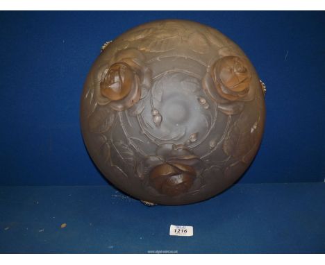 A pink frosted glass ceiling light 13½" diameter.