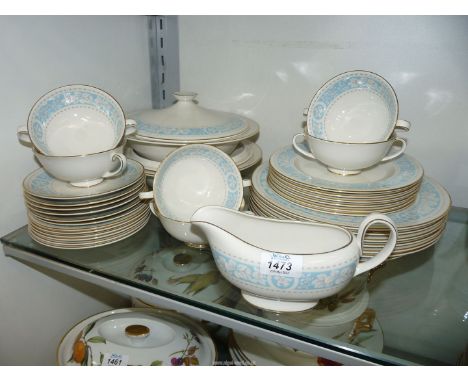 A Royal Doulton ''Hampton court'' dinner service including six dinner plates, six breakfast plates, six soup coups and twelve