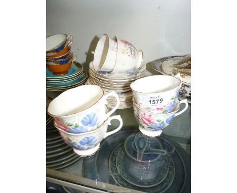 A Royal Albert 'Sweet Pea' Teaset for six: cups, saucers and tea plates.