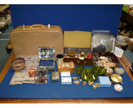 A Queen Elizabeth biscuit tin and contents including vintage buttons, fastening, jet style beads, plus vanity case, sewing ac