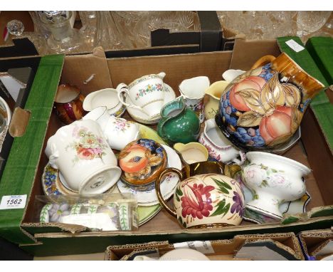 A large quantity of china including; Portmeirion napkin rings, Ming Rose cream jug and sugar bowl, Royal Doulton plates, Oakl