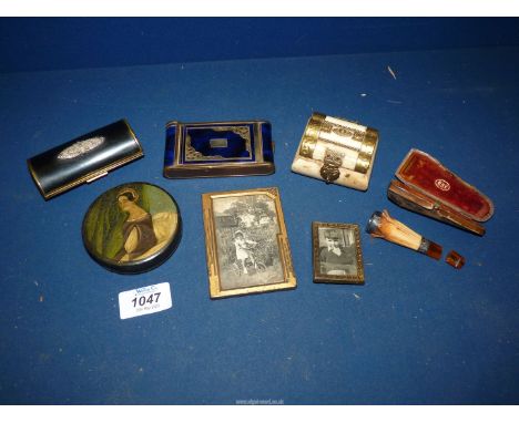 A small quantity of miscellanea to include; two small picture frames, a small bone trinket box with brass decorations, powder