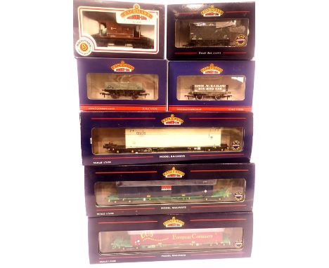 Three Bachmann Intermodal wagon sets; 37-300 B E.C.S, 37-302B Seaco, 37-301A Axis, all lacking couplings, and four other wago